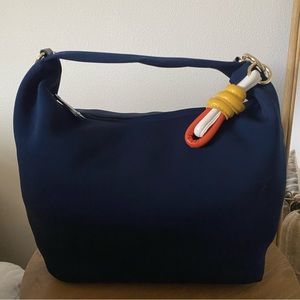 Sondra Roberts squared bag with colorful knotted keychain